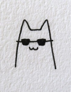 A cool small drawing idea of a cat with black glasses looking cool