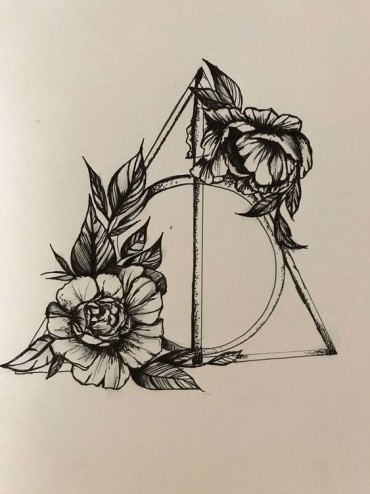 sign of the deathly hallows with flowers