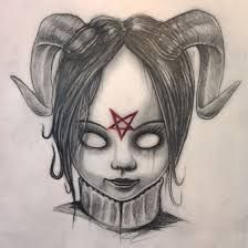A girl with horns and a bloody star on her foreheads