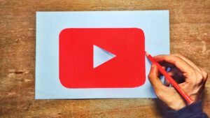someone drawing a the play button logo of youtube to know if someone can learn drawing from youtube
