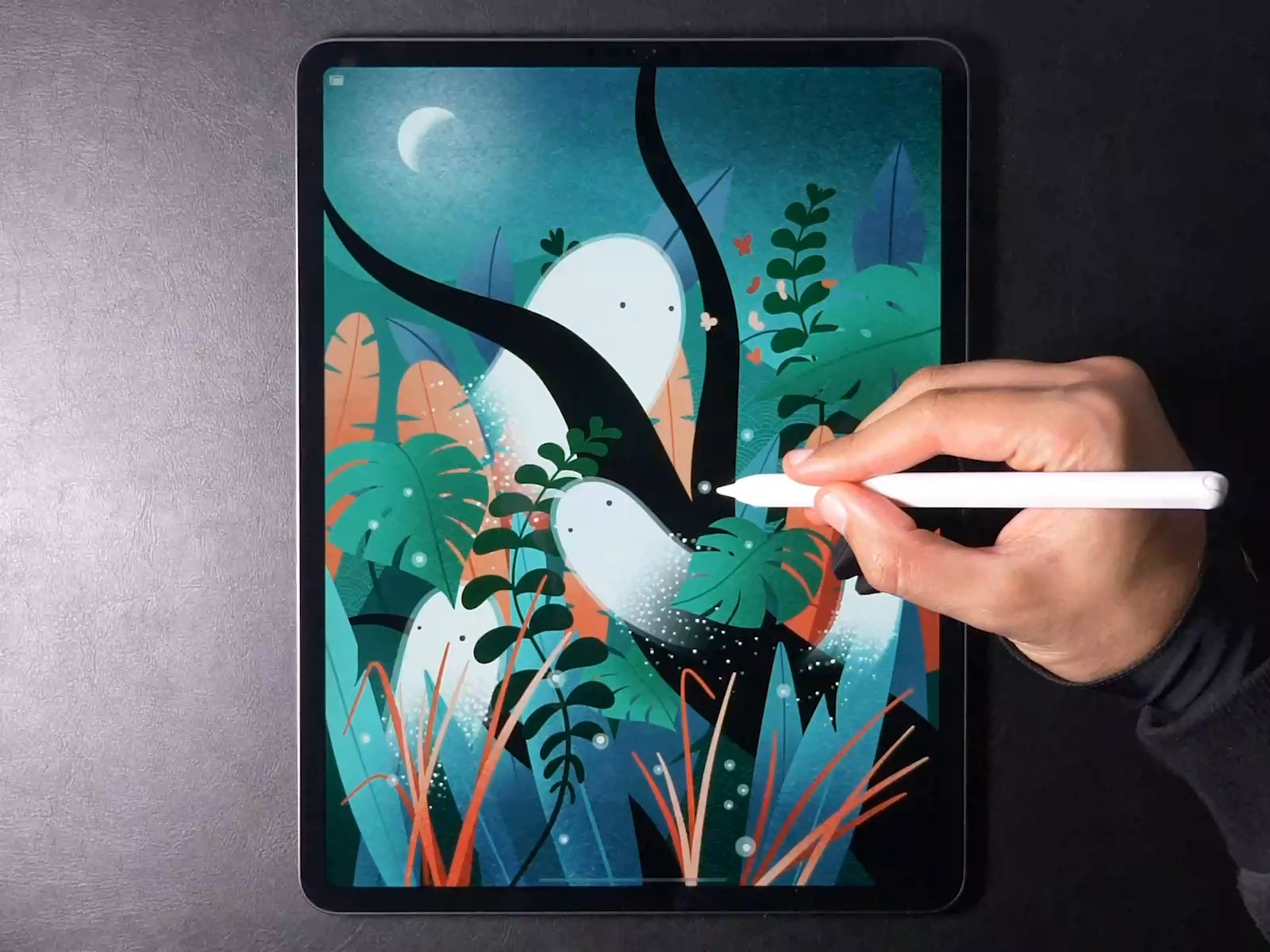 someone drawing a digital art drawing on an ipad pro with an apple pencil