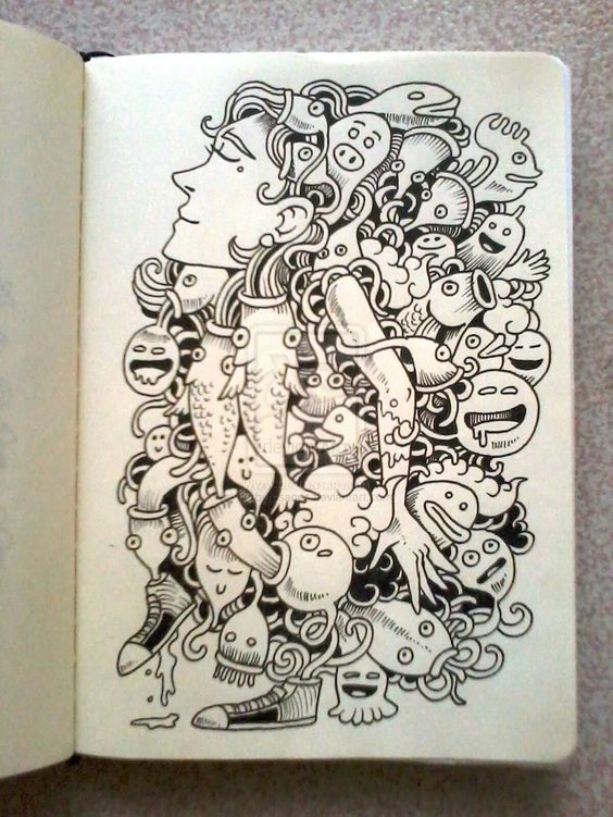 Weird doodles drawings in a sketchbook
