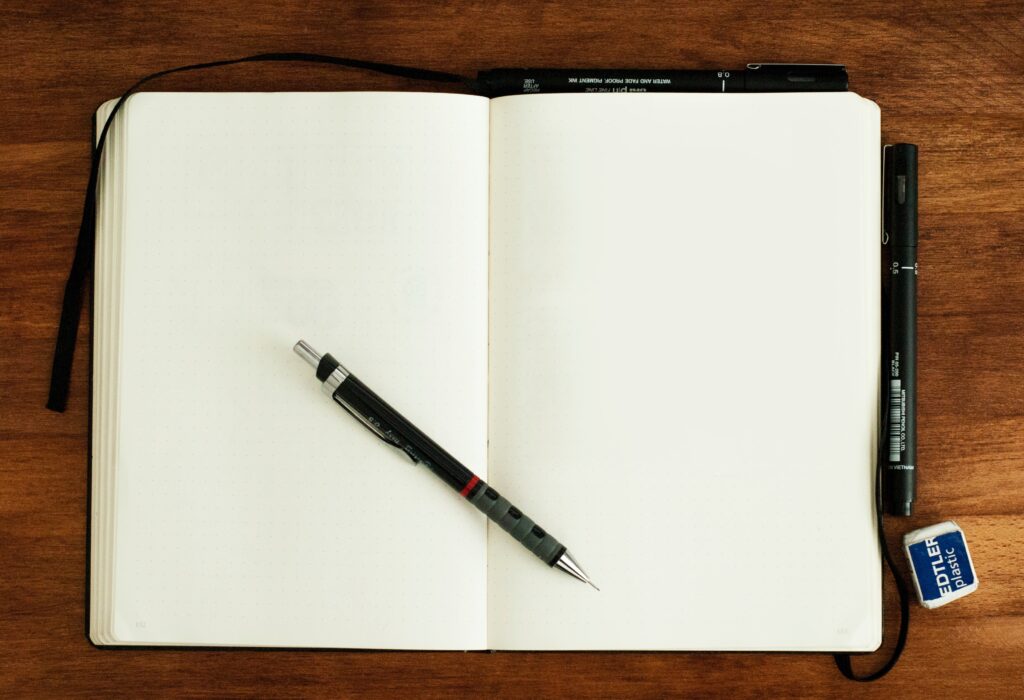 black pages of a sketchbook